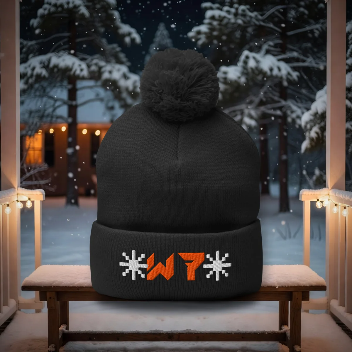 Snowflake W7 Pom Beanie in Black, a styled photo