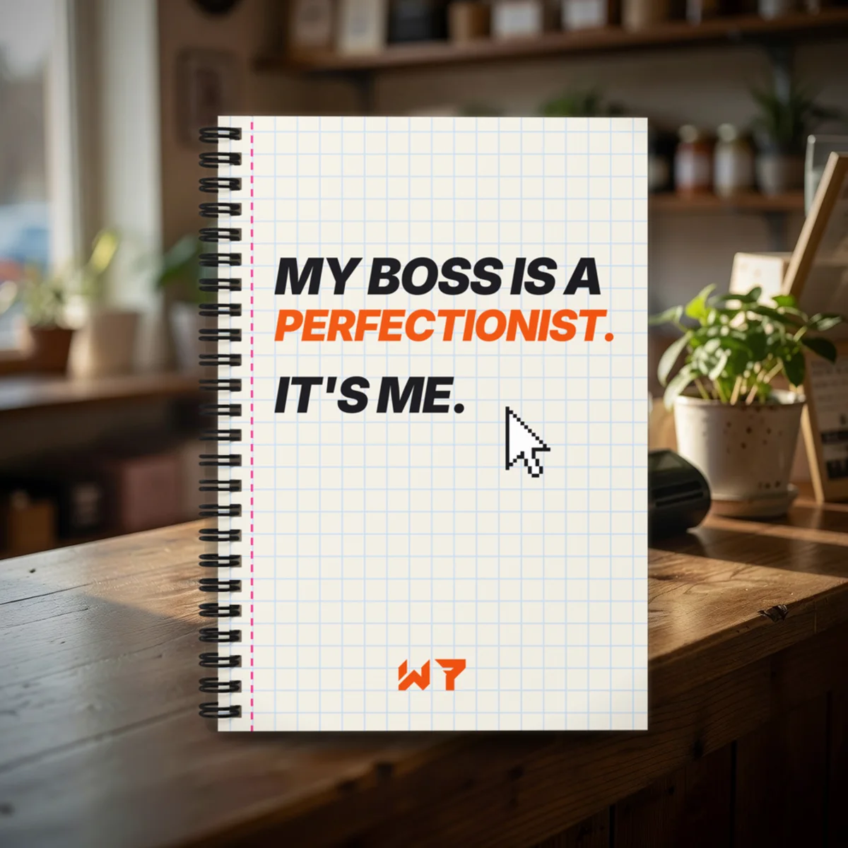 My Boss Is A Perfectionist Notebook notebook in a styled photo