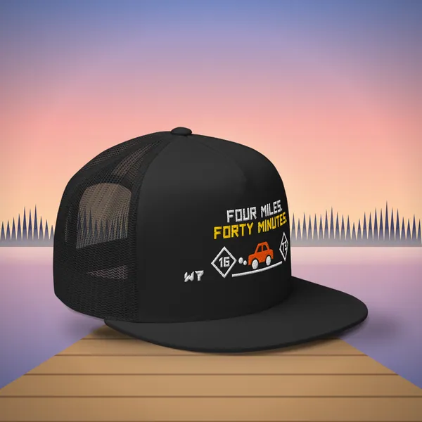 W7 Four Miles Forty Minutes Trucker Hat in Black, a styled photo
